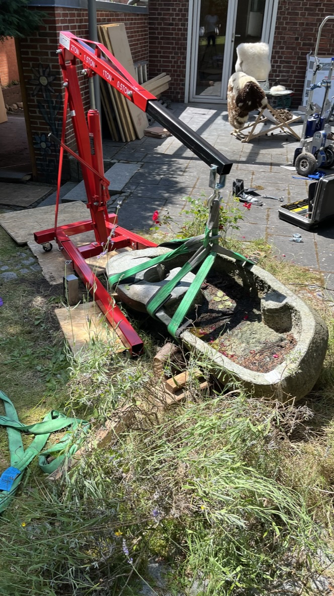 Steinbrunnentransport mit Pianoplan Treppensteiger